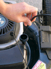 Pulling the extractor tube out of the engine to stop extraction